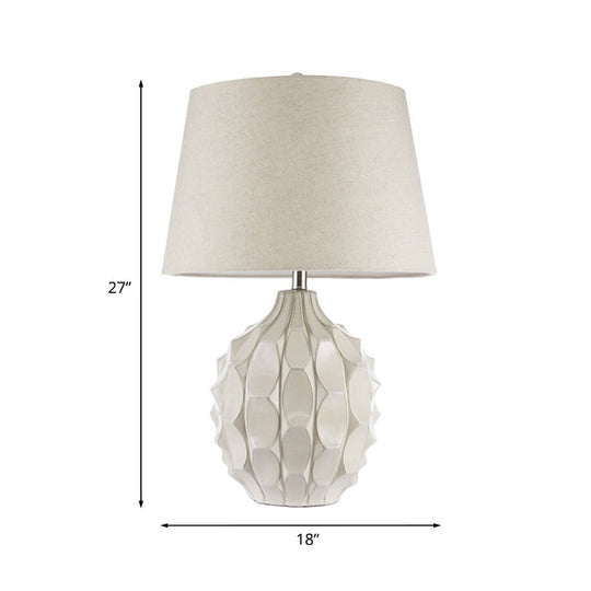 Rustic Pinecone Ceramic Nightstand Lamp With Tapered Drum Shade - White