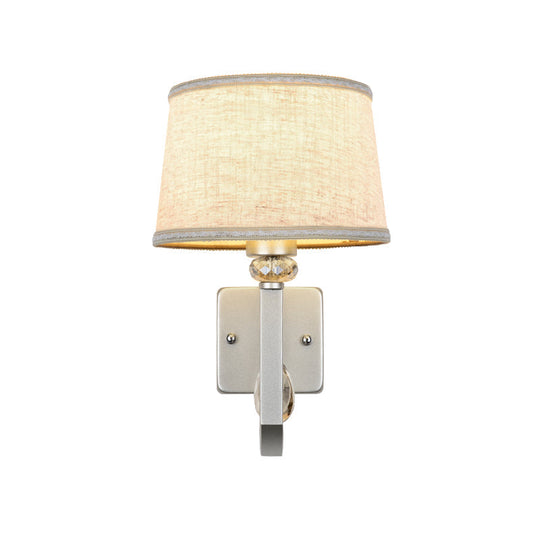Modern Wall Sconce With Fabric Drum Shade And Silver Metal Backplate