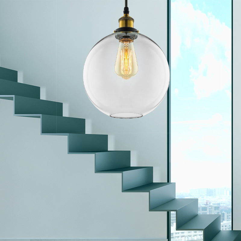 Industrial Globe Clear Glass Pendant Light With Antique Brass Finish - 1-Light Hanging Kit