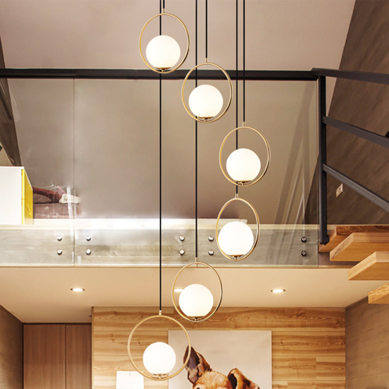Contemporary Globe Multi Ceiling Lamp With Cream Glass And Black Halo Ring: Staircase Suspension