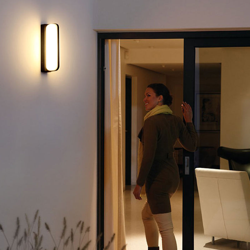 Minimalist Black Acrylic Led Wall Sconce For Yard - Capsule Shape