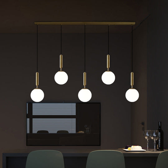 Sleek Brass Ball Pendant Light For Open Kitchen Simplicity Glass Ceiling Fixture