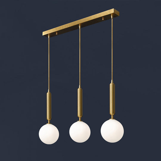 Postmodern Brass Pendant With Ball Glass Shades - Stylish 3-Light Ceiling Fixture For Dining Rooms