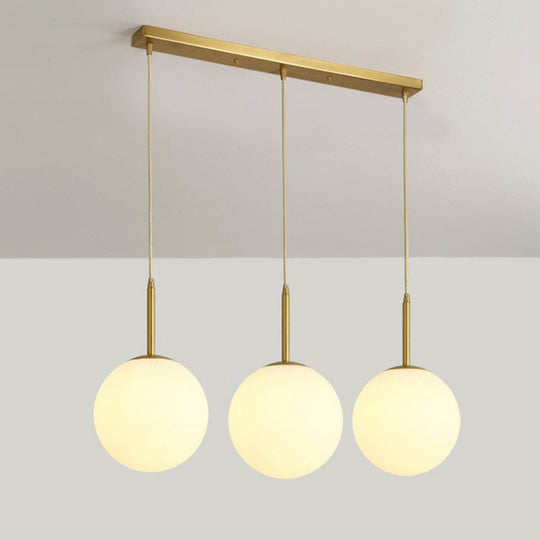 Minimalistic 3-Bulb Gold Pendant Light For Dining Room - Opal Glass Sphere Design / 23.5