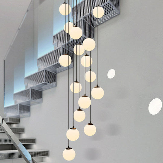 Minimalist Black Globe Pendant Light With Cream Glass - Ideal For Stairways