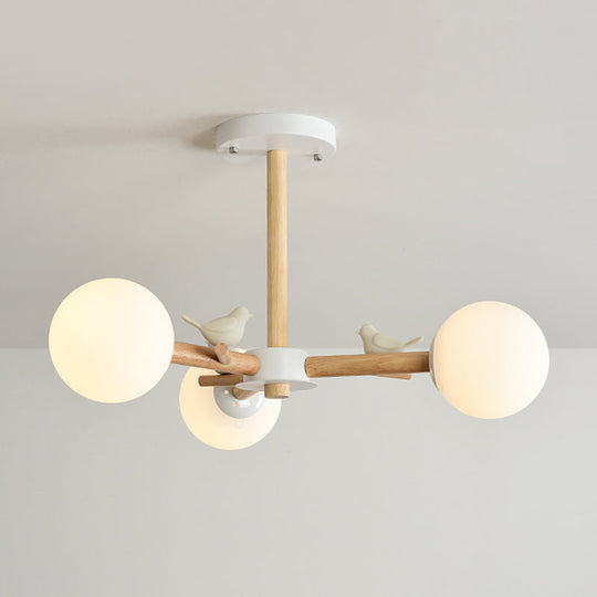 Japanese-Inspired Bedroom Chandelier With Orb Shade Birds Wood And Glass In White