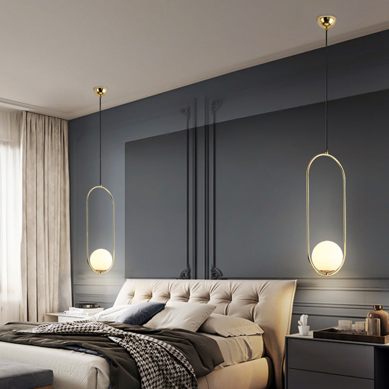 White Glass Pendant Light With Mid-Century Globe Design And Metal Ring