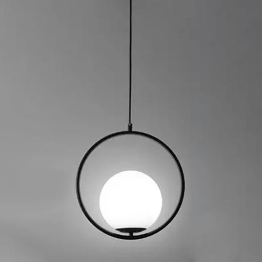 White Glass Pendant Light With Mid-Century Globe Design And Metal Ring