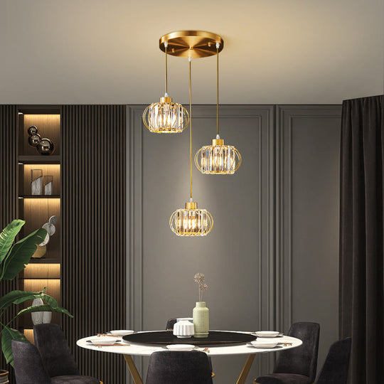 Modern Brass Globe Pendant Light With Crystal Accents Stylish Ceiling Lantern For Dining Area
