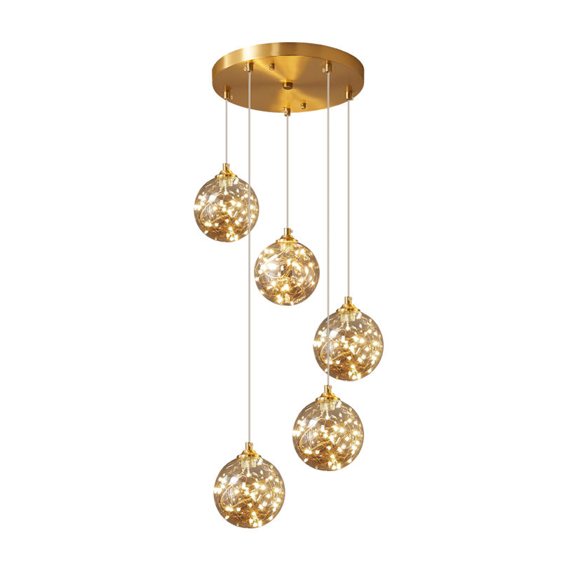 Amber Glass Led Pendant Lamp With Brass Finish - Nordic Style Lighting For Bedroom