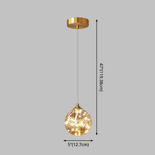 Amber Glass Led Pendant Lamp With Brass Finish - Nordic Style Lighting For Bedroom