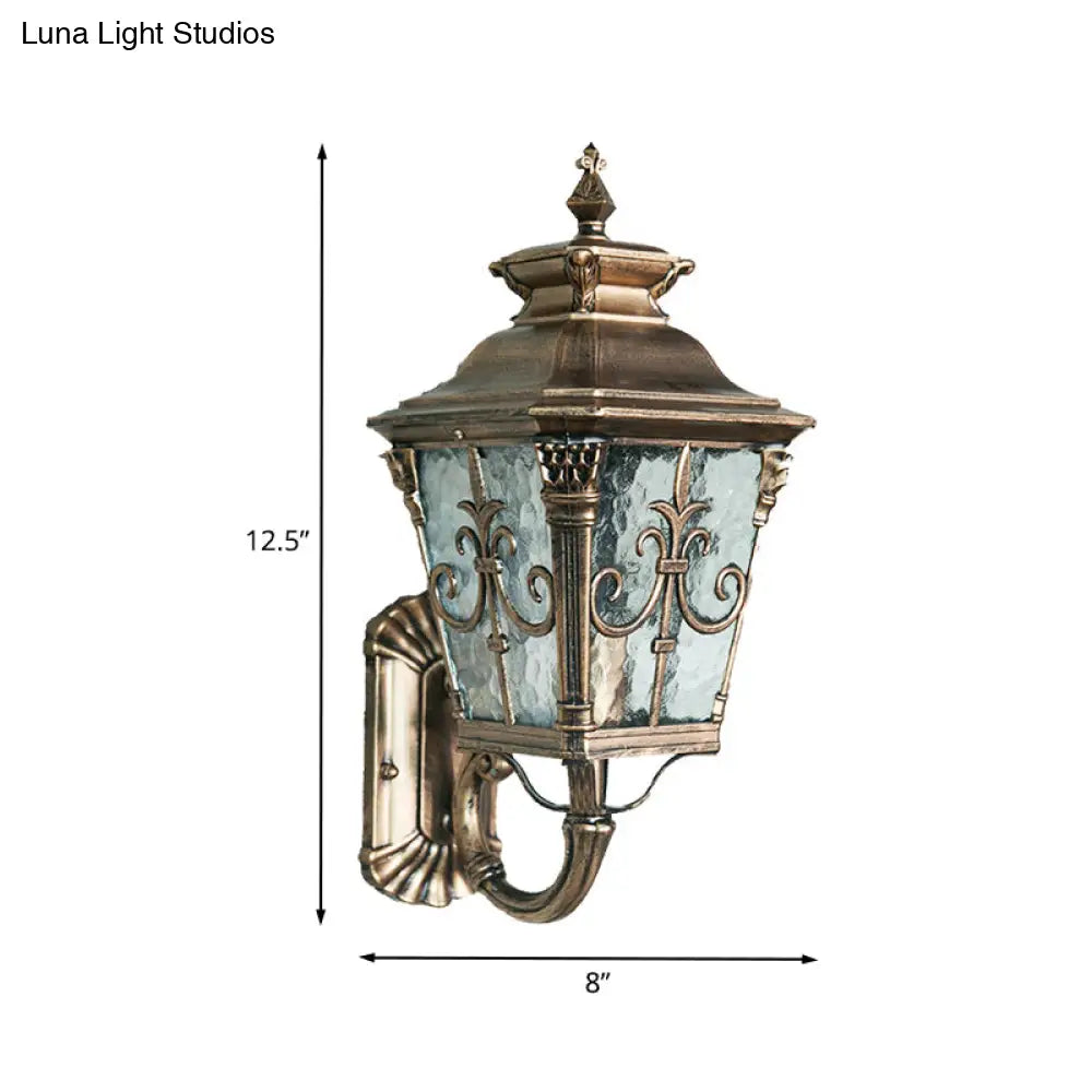 Country Brass Outdoor Wall Sconce With Pointed Flower Design