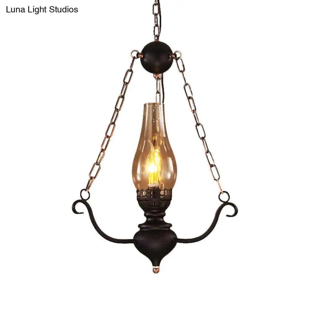 Modern Farmhouse Ceiling Light With Elongated Clear Glass Pendant And Black Chain Decor
