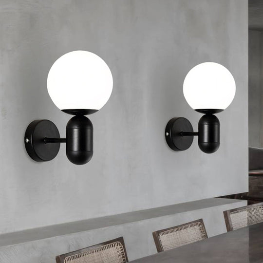 Modern White Wall Lamp With Globe Shade Capsule Body - Metal & Glass Light For Meeting Room