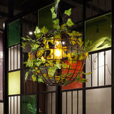 Industrial Globe Cage Ceiling Pendant Light With Iron Pendulum And Artificial Plant Deco In Black
