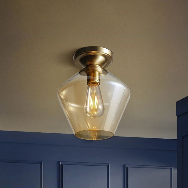 Contemporary Brass Flush Ceiling Fixture With Amber Glass Lampshade