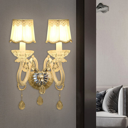Traditional White Candle Wall Lamp With Clear Crystal Accent And Scalloped Fabric Shade