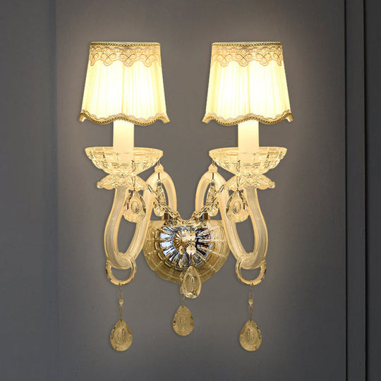 Traditional White Candle Wall Lamp With Clear Crystal Accent And Scalloped Fabric Shade