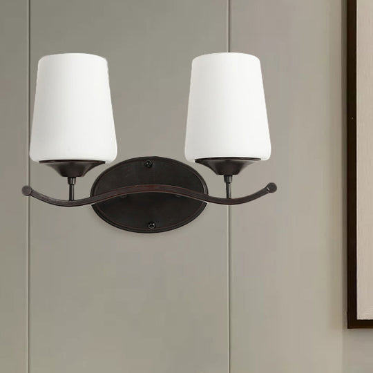 Ivory Glass Vanity Lighting With Iron Wavy Arm - Traditional Black Tapered Wall Light For Bedroom