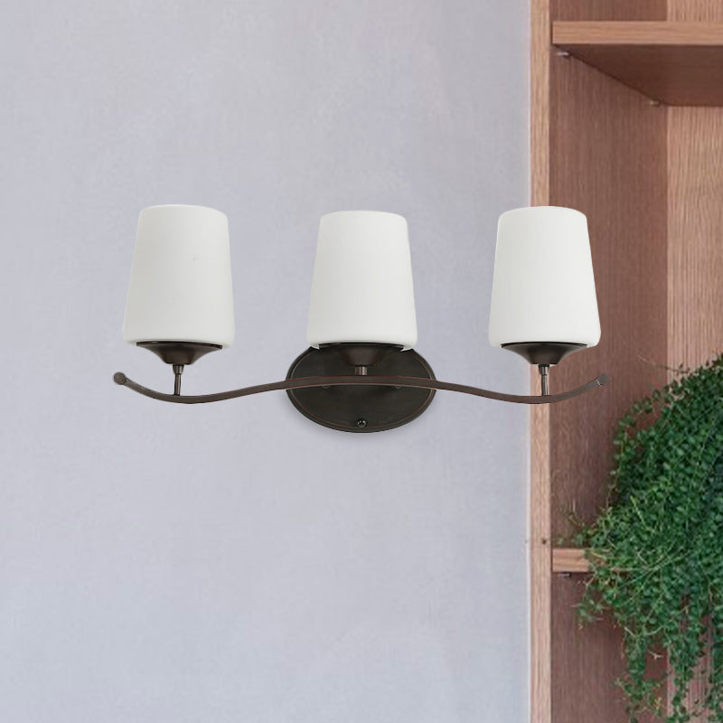 Ivory Glass Vanity Lighting With Iron Wavy Arm - Traditional Black Tapered Wall Light For Bedroom