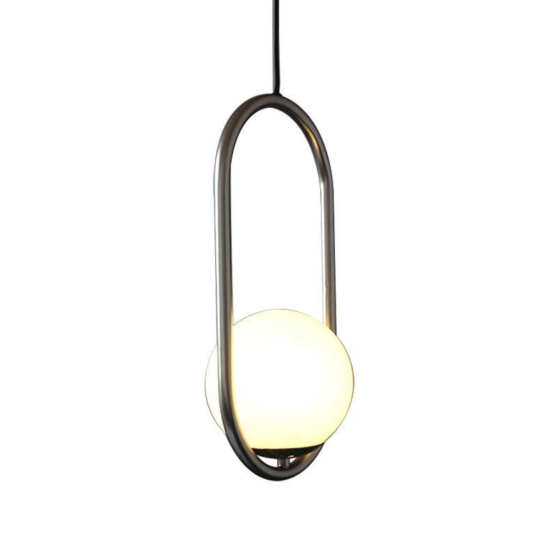 Sleek Chrome Oblong Pendant Light With Minimalist Design And Orb White Glass Shade