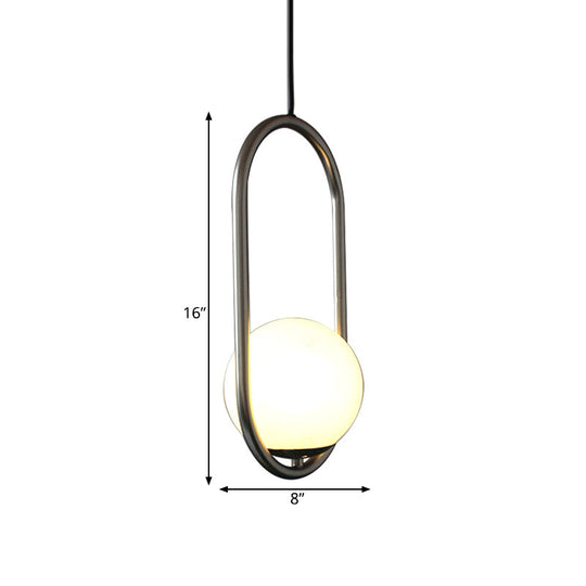 Sleek Chrome Oblong Pendant Light With Minimalist Design And Orb White Glass Shade