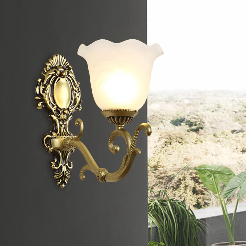 Vintage Brass/Beige Frosted Ribbed Glass Wall Sconce Lamp With Curvy Arm - 1 Light Bloom