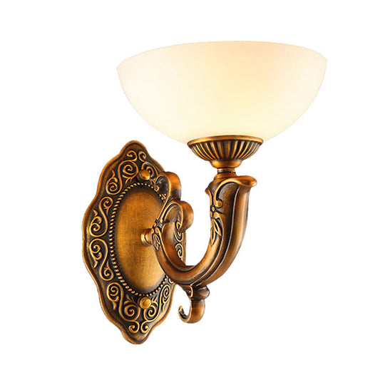 Rustic Brass Wall Sconce With Frosted Glass Shade - Swooping Arm Design For Ambient Lighting