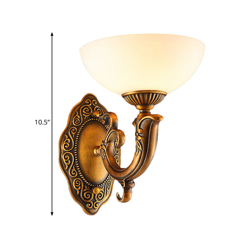 Rustic Brass Wall Sconce With Frosted Glass Shade - Swooping Arm Design For Ambient Lighting
