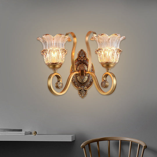 Country-Style Brass Wall Sconce With Crystal Glass Flower Accent And Swooping Arm - 1/2 Bulb Light
