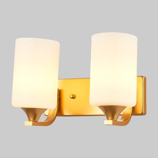 Traditional 2-Bulb Gold Wall Lamp With Milky Glass Cylindrical Fixture