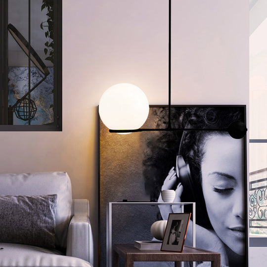 Globe Hotel Ceiling Suspension Lamp - Frosted White Glass Postmodern Drop Pendant In Black/Gold