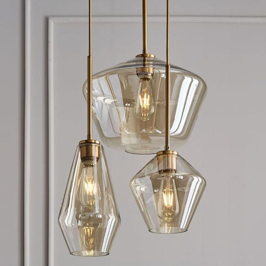 Postmodern Clear Glass Pendant Light In Gold For Restaurants - 1-Light Gyro/Gem/Diamond Design