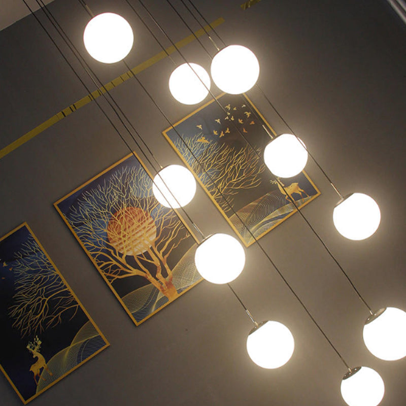 Modernist Cream Glass Ball Pendant Light With 10 Black Suspension Lamps - Perfect For Living Room