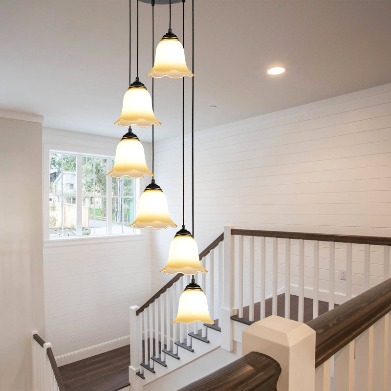 Minimalist Black Flower Stairs Pendant Light With Frosted Glass And Round Canopy