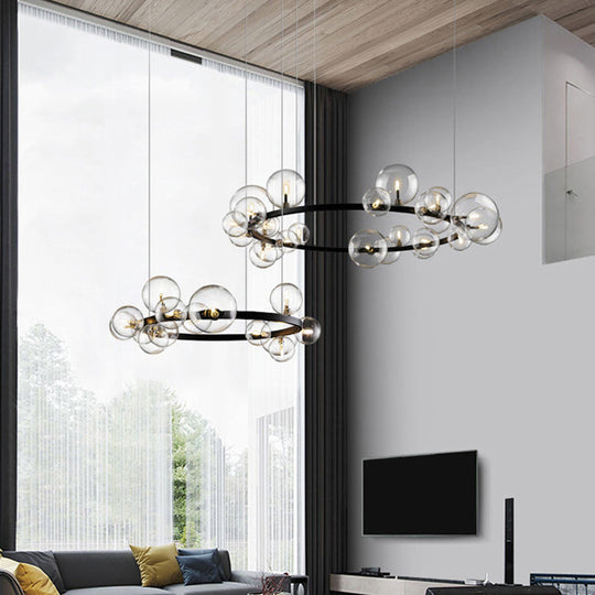 Lustre suspendu noir minimaliste avec orbe en verre transparent - Luminaire idéal pour la salle à manger