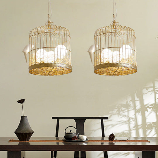 Rustic Matte White Glass Egg Shaped Chandelier With Bird And Birdcage - 3 Light Hanging Fixture