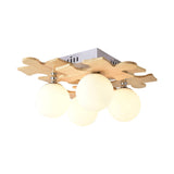 Japanese Style Round Flush Mount Ceiling Light Fixture With White Glass And Wooden Accent - 4 Bulb