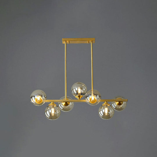 Postmodern Gold Finish Amber Glass Ball Island Hanging Lamp For Table Illumination