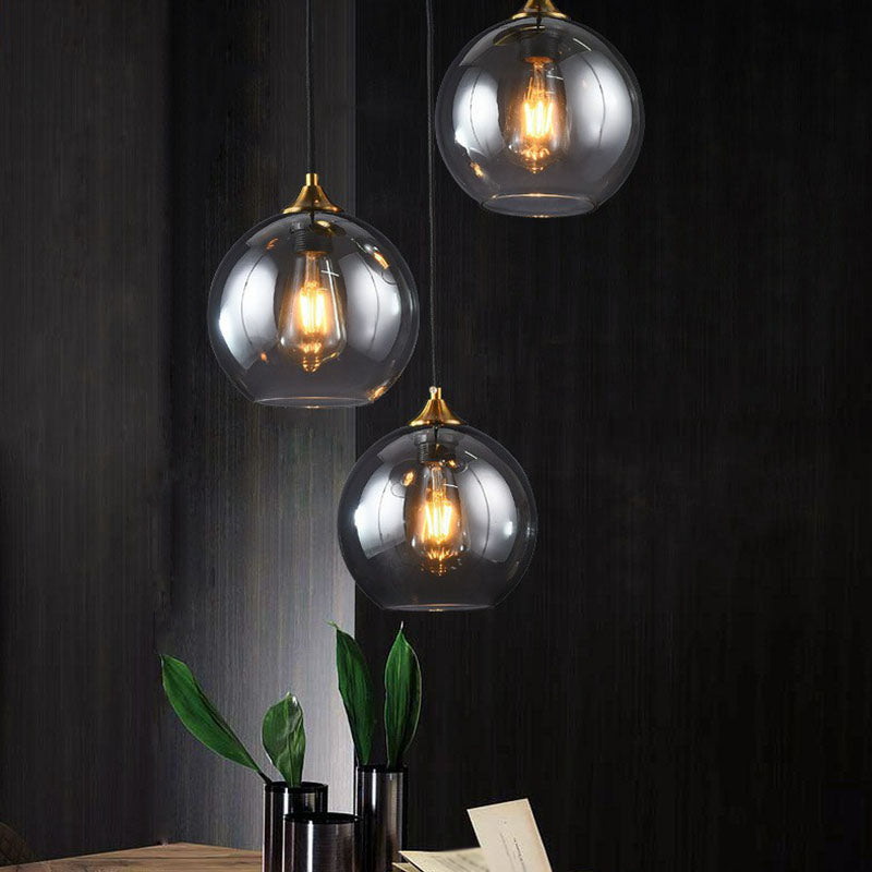 Antiqued Brass Globe Pendant Lamp With 3 Lights And Glass Shade