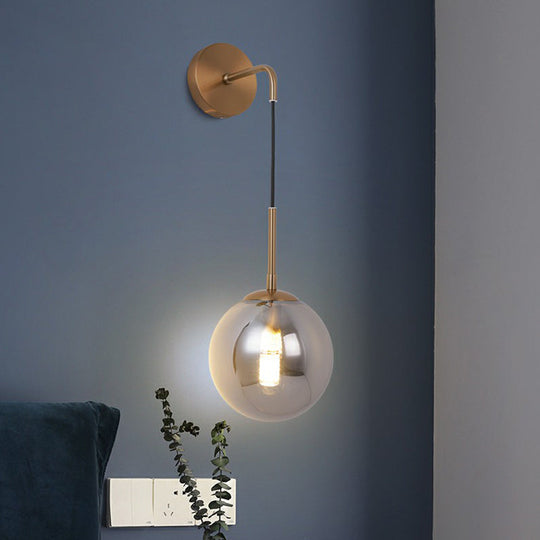 Sleek Silver Glass Ball Wall Hanging Lamp With Brass Mount - Perfect Bedroom Lighting Solution