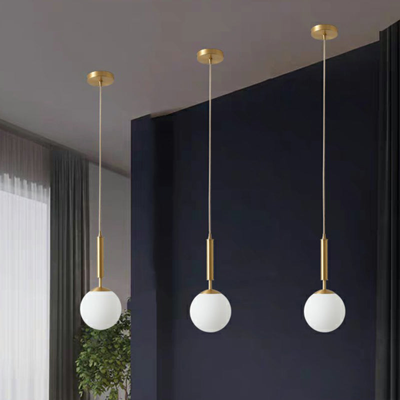 Minimalist Milk Glass Ball Pendant Light In Brass - 1-Light Hanging Lamp For Dining Room
