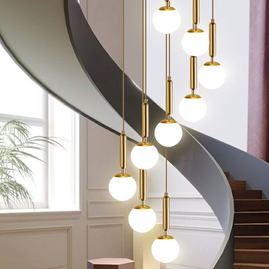 Gold Multi Hanging Stairway Light With Minimalist White Glass Ball Pendant 9 / Globe