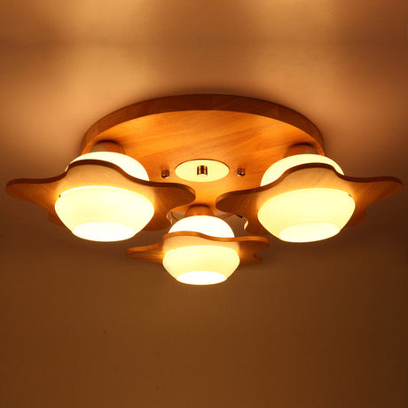 Modern Ivory Glass Flower Ceiling Light With 3-Head Flush Mount For Bedroom In Wood Finish