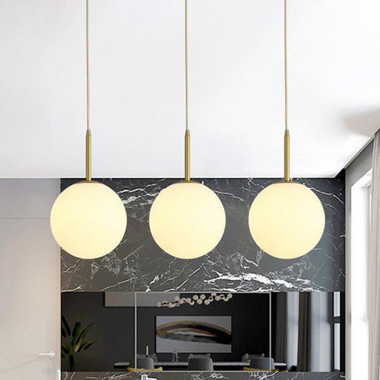 Minimalistic 3-Bulb Gold Pendant Light For Dining Room - Opal Glass Sphere Design