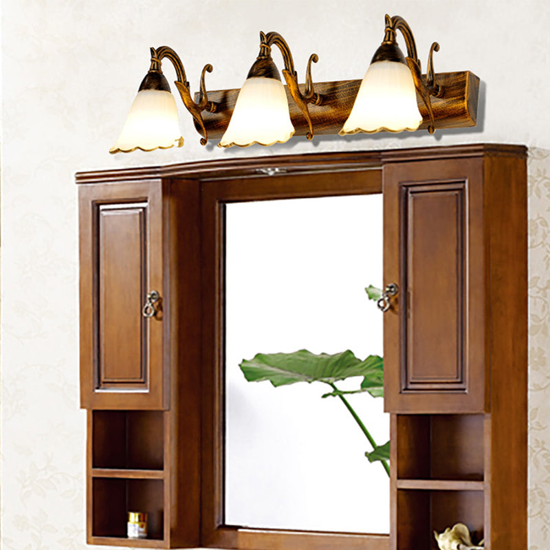 Bronze Wall Lamp With Country Flower Shade And White Rid Glass For Vanity Lighting