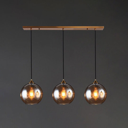Modern Blown Glass Sphere Pendant Lights For Bedroom Amber / Linear
