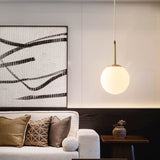 Mid-Century Modern Brass Pendant Light With Spherical White Glass Shade