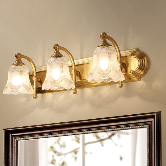 Brass Armed Wall Sconce With Ribbed Glass Shade For Bathroom Decoration