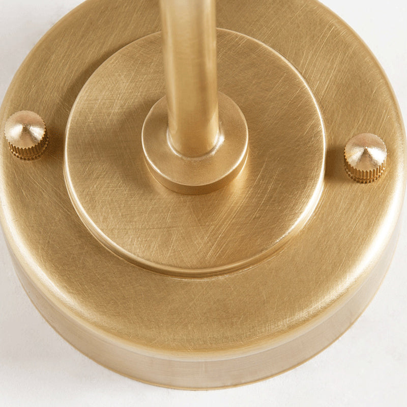 Contemporary Hand Blown Glass Wall Light With Brass Globe And Crossed Arm